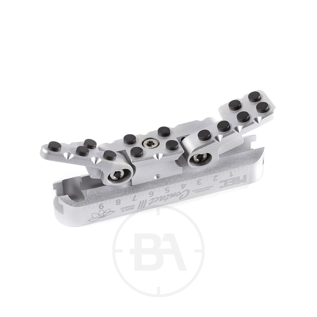 Gehmann 700-III MEC Contact-III Butt Plate 1 The Gehmann 700-III MEC Contact-III Butt Plate is a silver metal tool with black screws numbered 1–9, featuring adjustable sliding components and machined details, shown on a white background.
