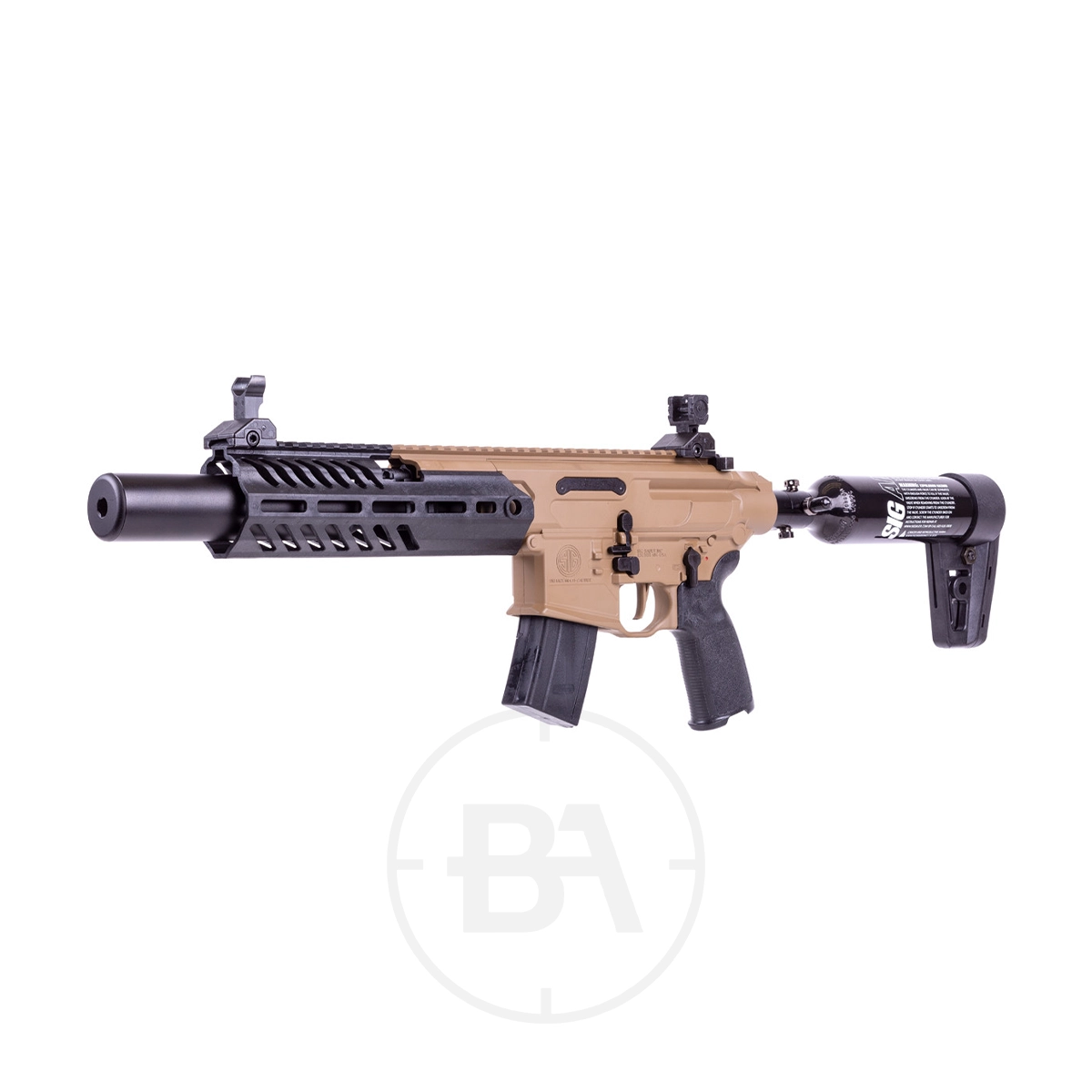 Sig Sauer MCX Rattler Canebrake PCP Air Rifle 3 A tan and black Sig Sauer MCX Rattler Canebrake PCP Air Rifle, featuring a short barrel and tactical design, is displayed against a white background.