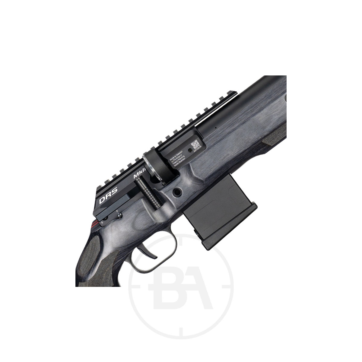FX Airguns DRS MKII Classic PCP Air Rifle 6 Close-up of the FX Airguns DRS MKII Classic PCP Air Rifle receiver and magazine, featuring part of the stock and trigger assembly with a dark grey and black finish, shown against a white background.