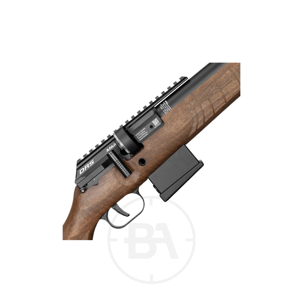 FX Airguns DRS MKII Classic PCP Air Rifle 4 Close-up of an FX Airguns DRS MKII Classic PCP Air Rifle with wooden stock and black metal receiver, magazine inserted. The rifle is shown diagonally against a white background.