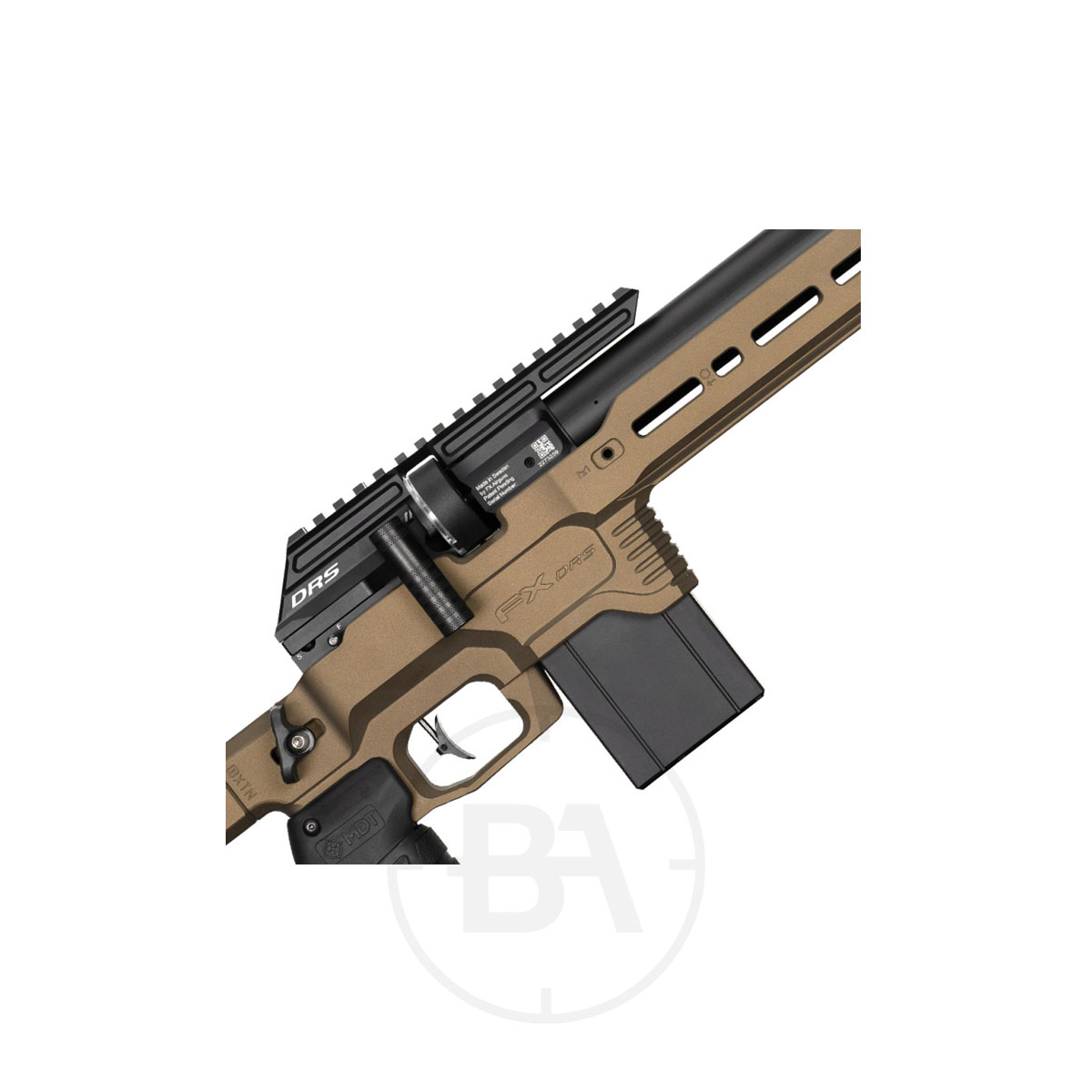 FX Airguns DRS MKII Pro MDT PCP Air Rifle 2 Close-up of a tan and black FX Airguns DRS MKII Pro MDT PCP Air Rifle, focussing on the trigger, magazine, rail system, and part of the barrel against a white background.