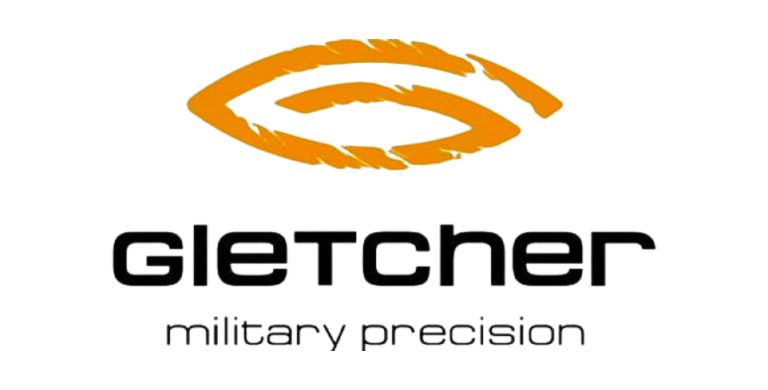 The image shows the Gletcher logo with an orange stylized "G" above the words "gletcher military precision" in black text.