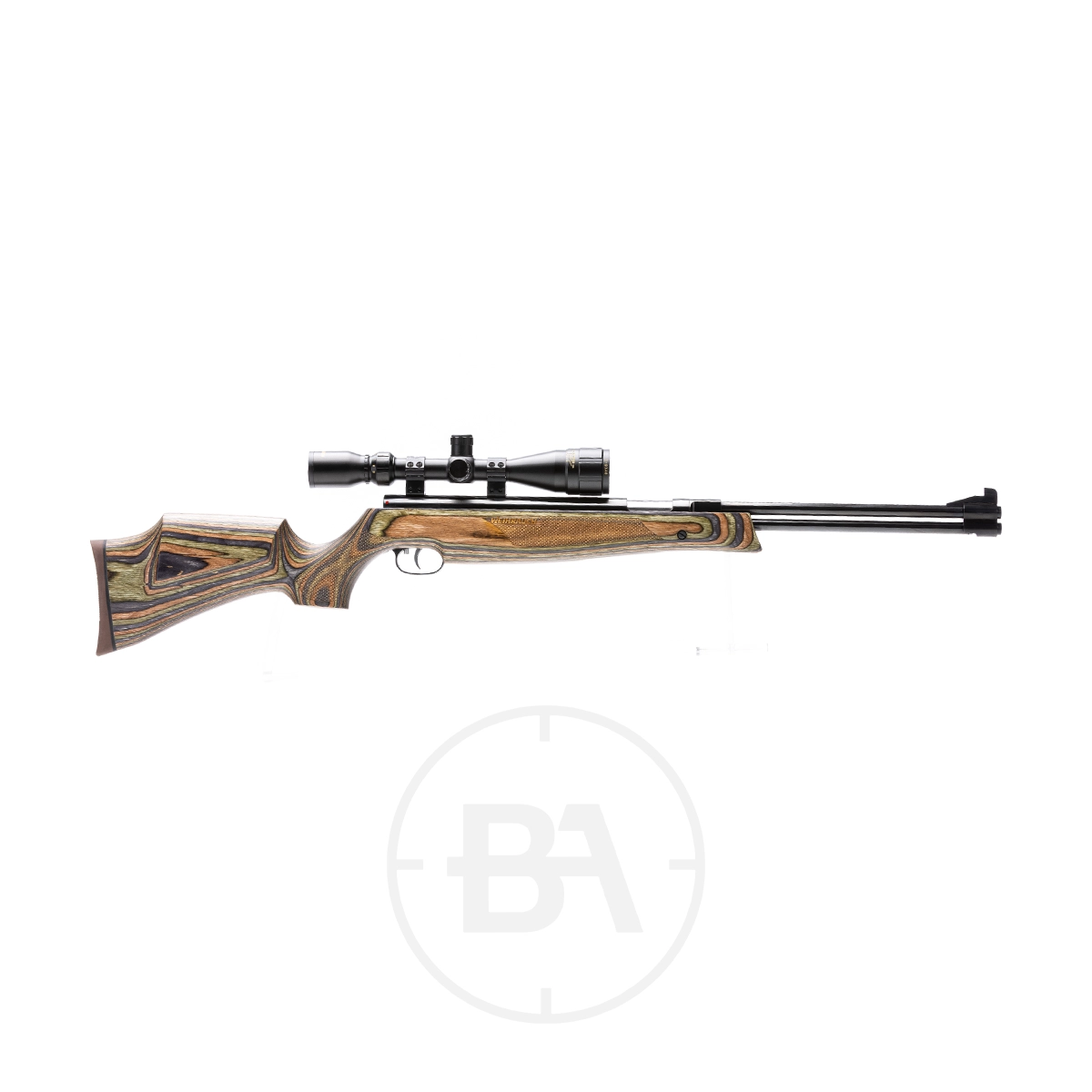 Weihrauch HW77 K Spring Air Rifle 5 A Weihrauch HW77 K spring air rifle in .177 caliber, featuring a wooden stock and mounted scope, is displayed in profile on a white background.
