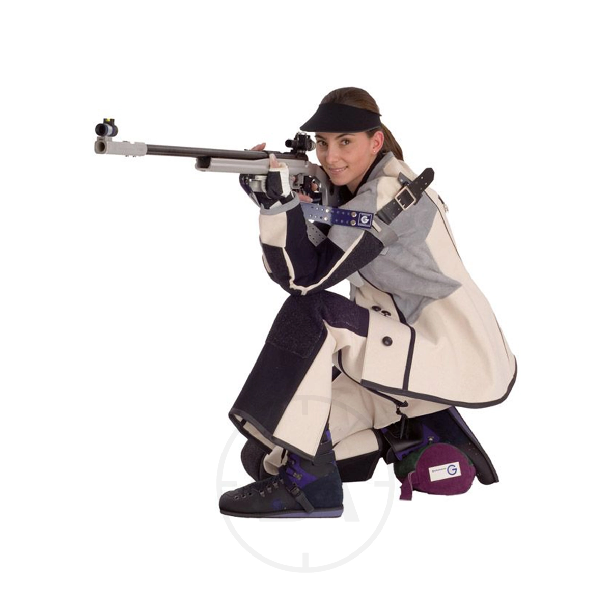 Gehmann Micro-Adjustable Artificial Sling 9 A shooter in a jacket and gear kneels while aiming a rifle equipped with the Gehmann Micro-Adjustable Artificial Sling, looking ahead against a plain white background.