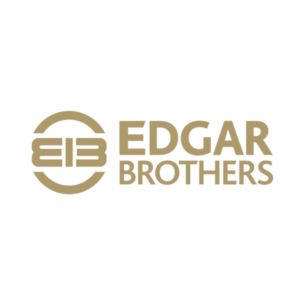 Edgar Brothers logo featuring a stylized "EB" inside a circle to the left of the words "EDGAR BROTHERS" in bold, gold lettering on a white background.